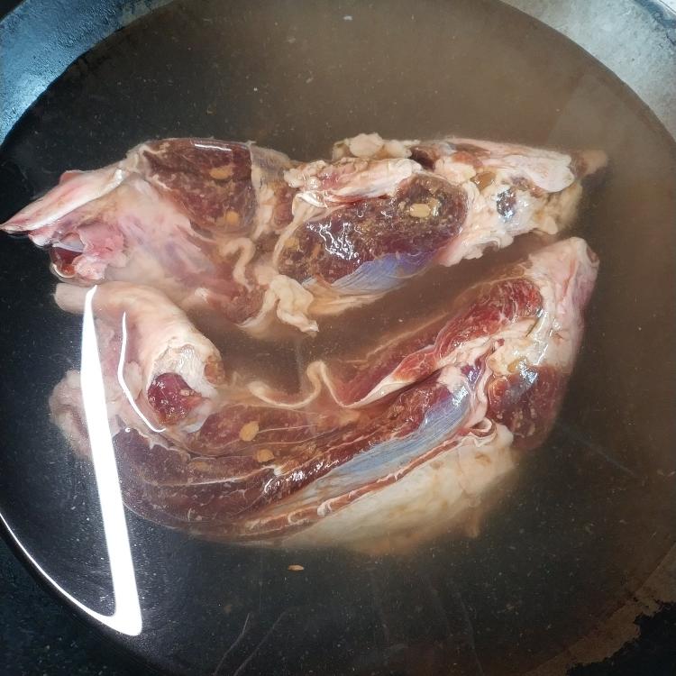 Blanch the beef from cold water, heating gently then boiling