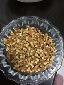 Dice the five-spice dried tofu into cubes the same size as the pork