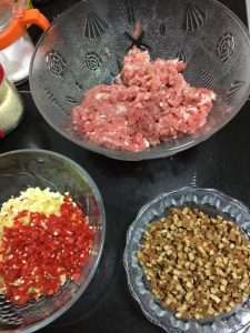 Weigh the pork, tofu, and aromatics to keep a 3 to 1 to 1 ratio