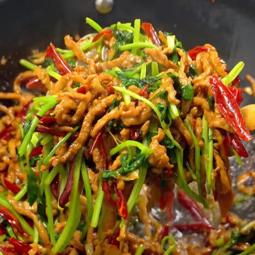 Spicy shredded pork with cilantro and crispy chili threads