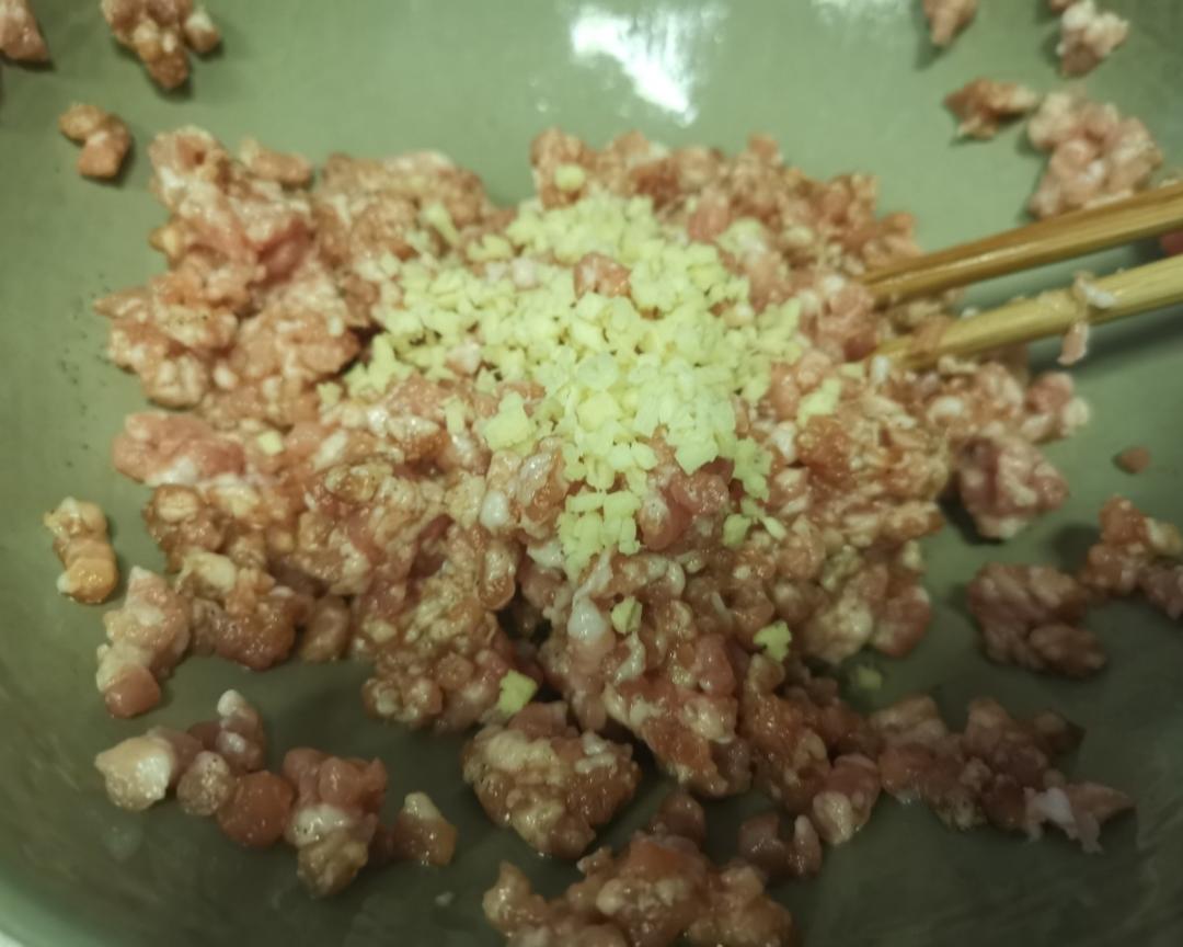 Add minced ginger and mix