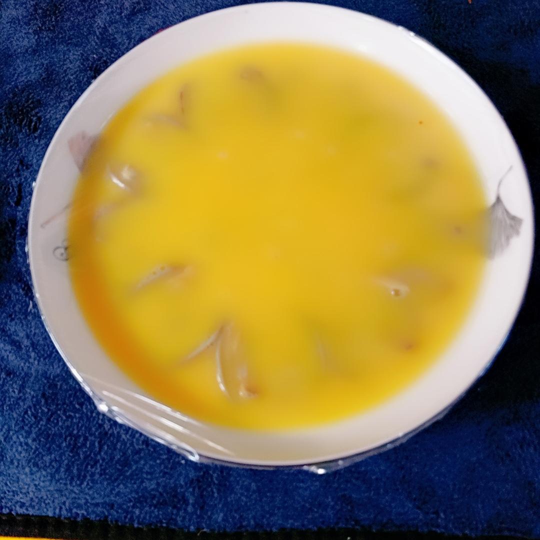 Strain the egg, cover, and steam for ten minutes