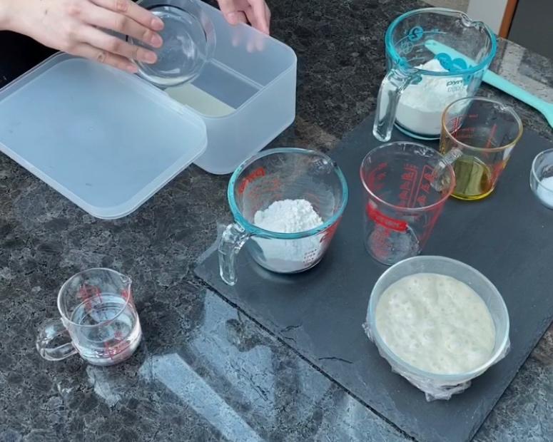 Adding water and yeast for the main dough