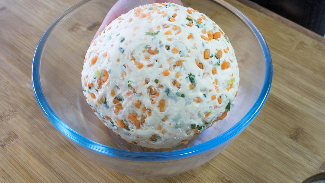 Kneading the dough into a smooth ball
