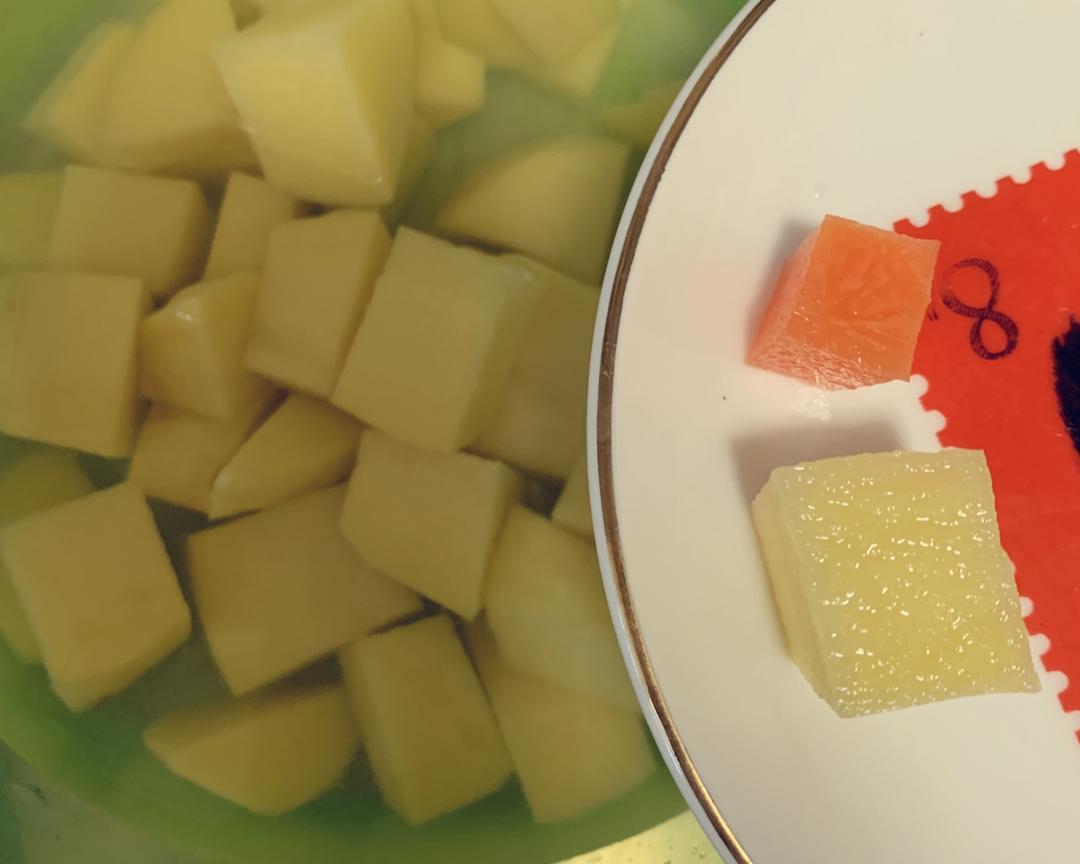 Chopped potatoes soaking in cold water