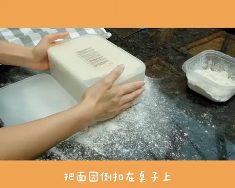 Dusting flour on the work surface for shaping