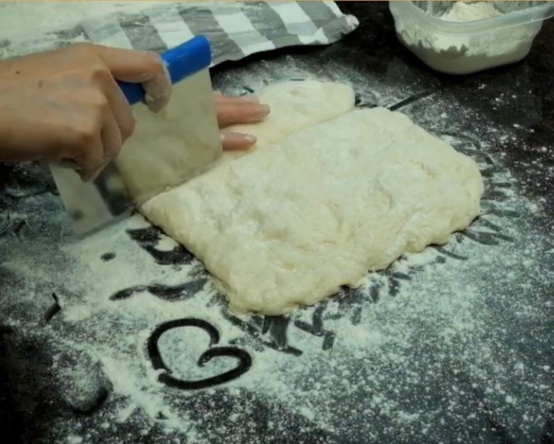 Dividing the dough into three equal pieces