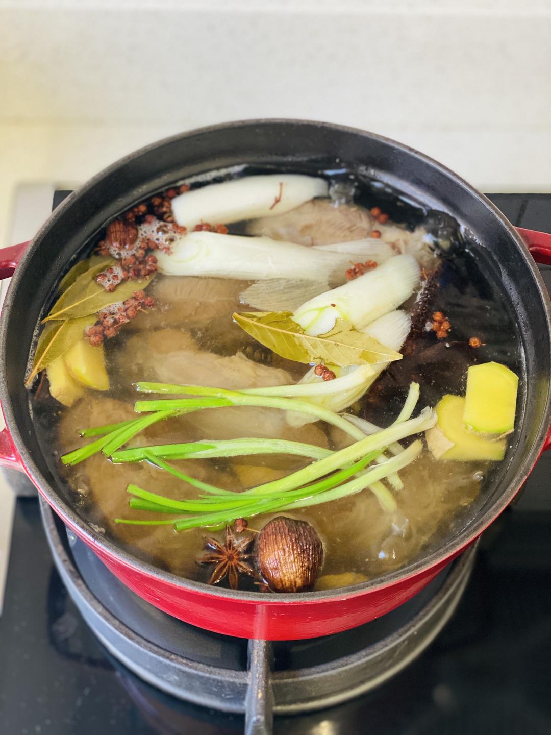 Adding the beef and spices to the pot