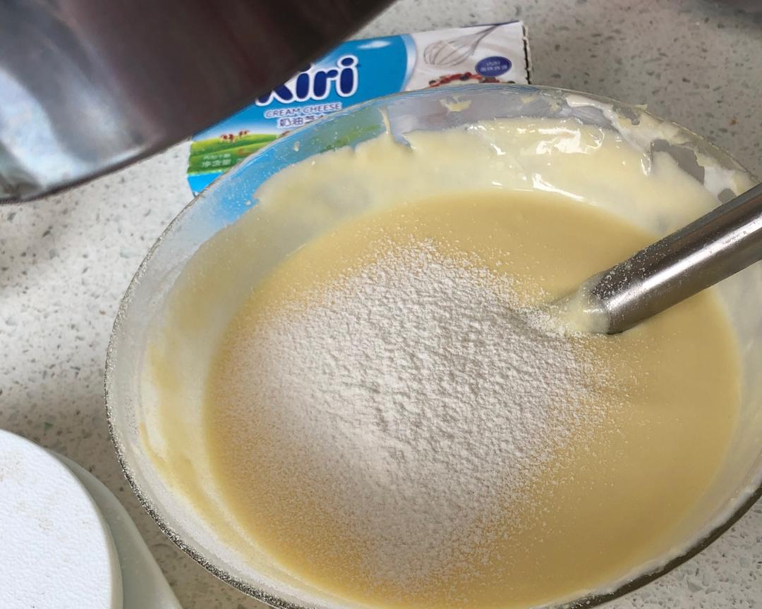 Add Starch: Sift the cornstarch over the batter
