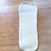 Shape: Flatten a ball into an oval. Fold