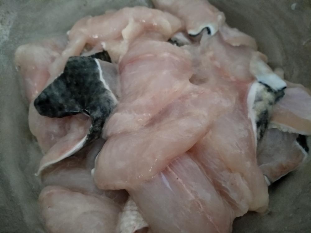 Velvet the fillets with salt, egg white, and cornstarch