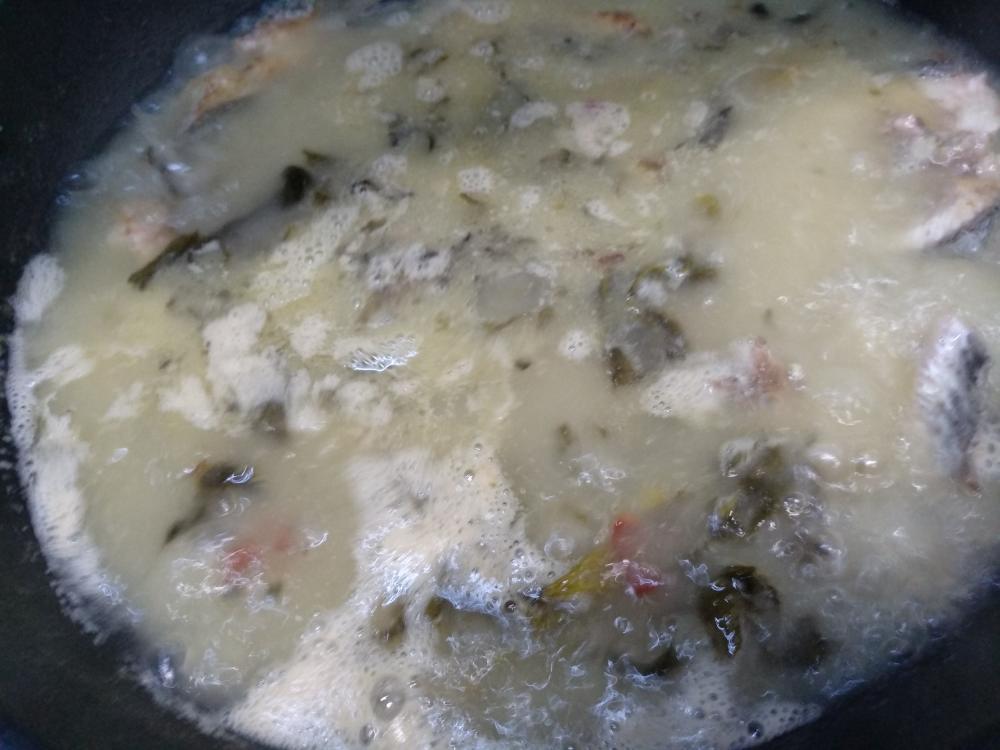 Simmer the broth with the bones and greens for five minutes