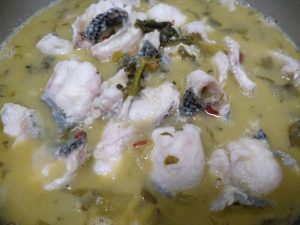 Poach the fillets in the boiling broth for one to two minutes