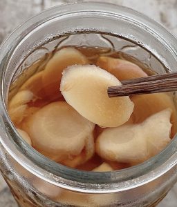 Pack the ginger in the jar, pour over the cooled brine, and refrigerate