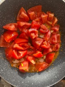 The finished tomato cod and tofu stew