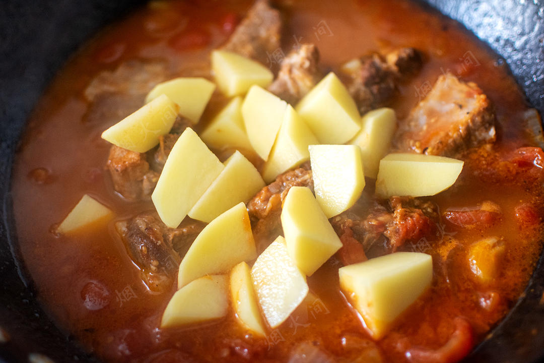 Add the potato chunks to the braising broth