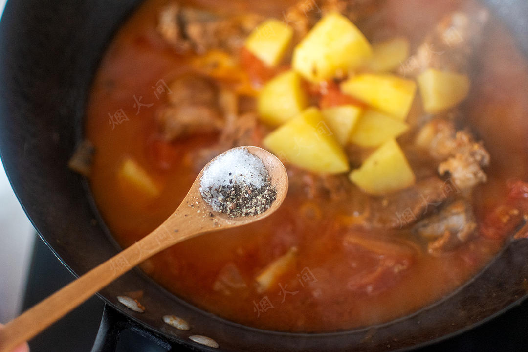 Season with salt and pepper and simmer until the potatoes are tender