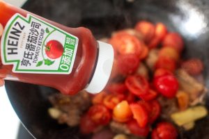 Add the ketchup for a rich sour-sweet depth