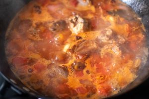 Add hot water and simmer the ribs for thirty to forty minutes