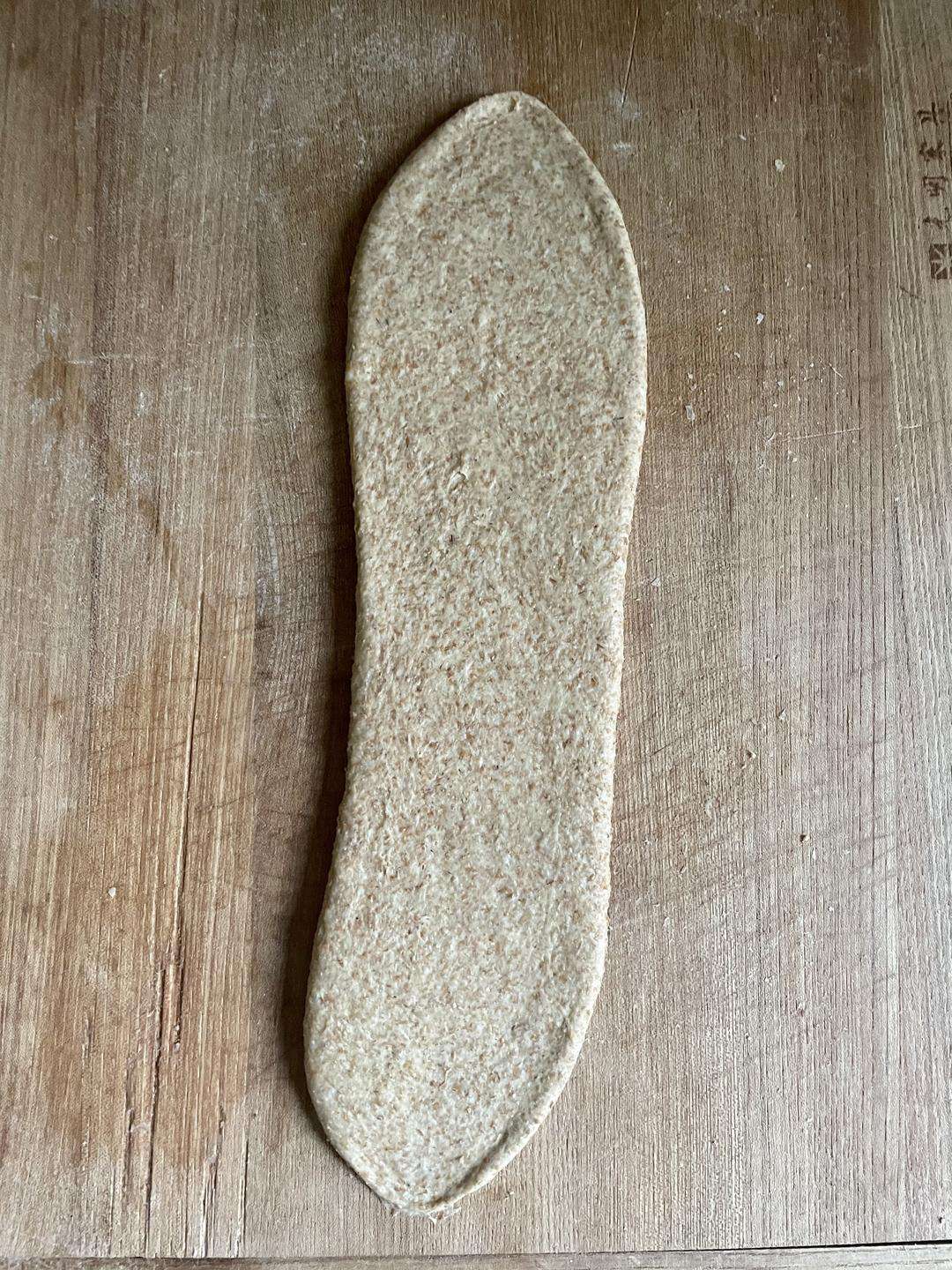 Roll each log a second time and place the rolls seam-side down in the loaf pan