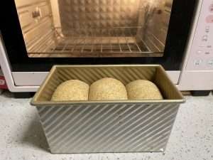 Second proof the covered loaf at a warm 30 to 38 degrees until it nears the pan rim