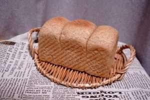 Bake the whole wheat toast at 180 degrees Celsius until golden and fully set