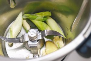 Bloom the scallion, ginger, and garlic in the oil
