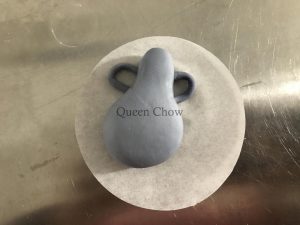 Aquarius bun shaped like a vase with handles