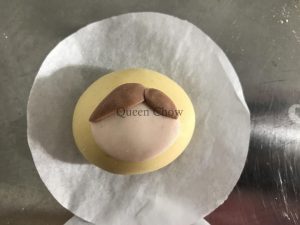 Taurus bun with brown teardrop horns and hair