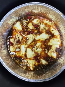 Spoon the sauce over the air-fried tofu and air fry again at 180°C (355°F) for 5 minutes.