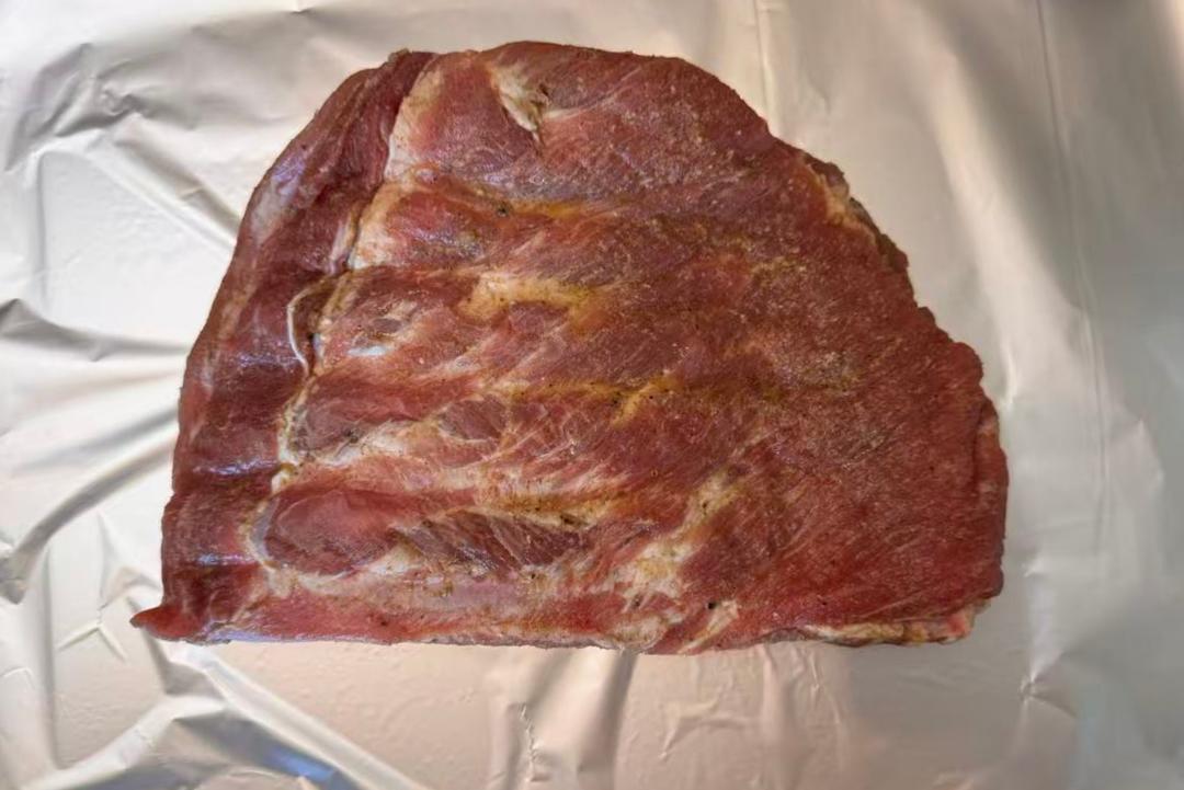 Wrapping the ribs in foil before roasting