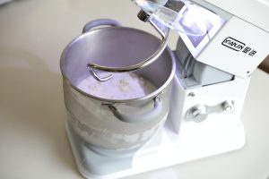 Weighing all the dough ingredients except butter into the mixer bowl