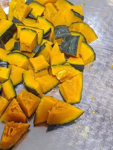 Steam the kabocha squash for 8 minutes, let it cool, then cut it into cubes.