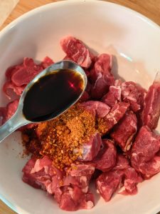 Whisking together the marinade ingredients