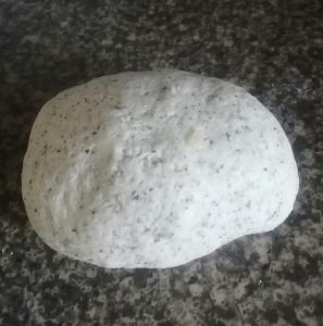 Turn the dough onto a lightly floured surface and knead for 8 to 10 minutes until it is smooth, elastic, and no longer sticky.