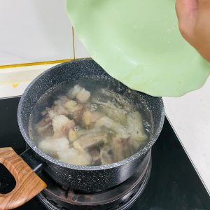 Blanch for 20 seconds, then scoop the fish out with a slotted spoon and set aside.