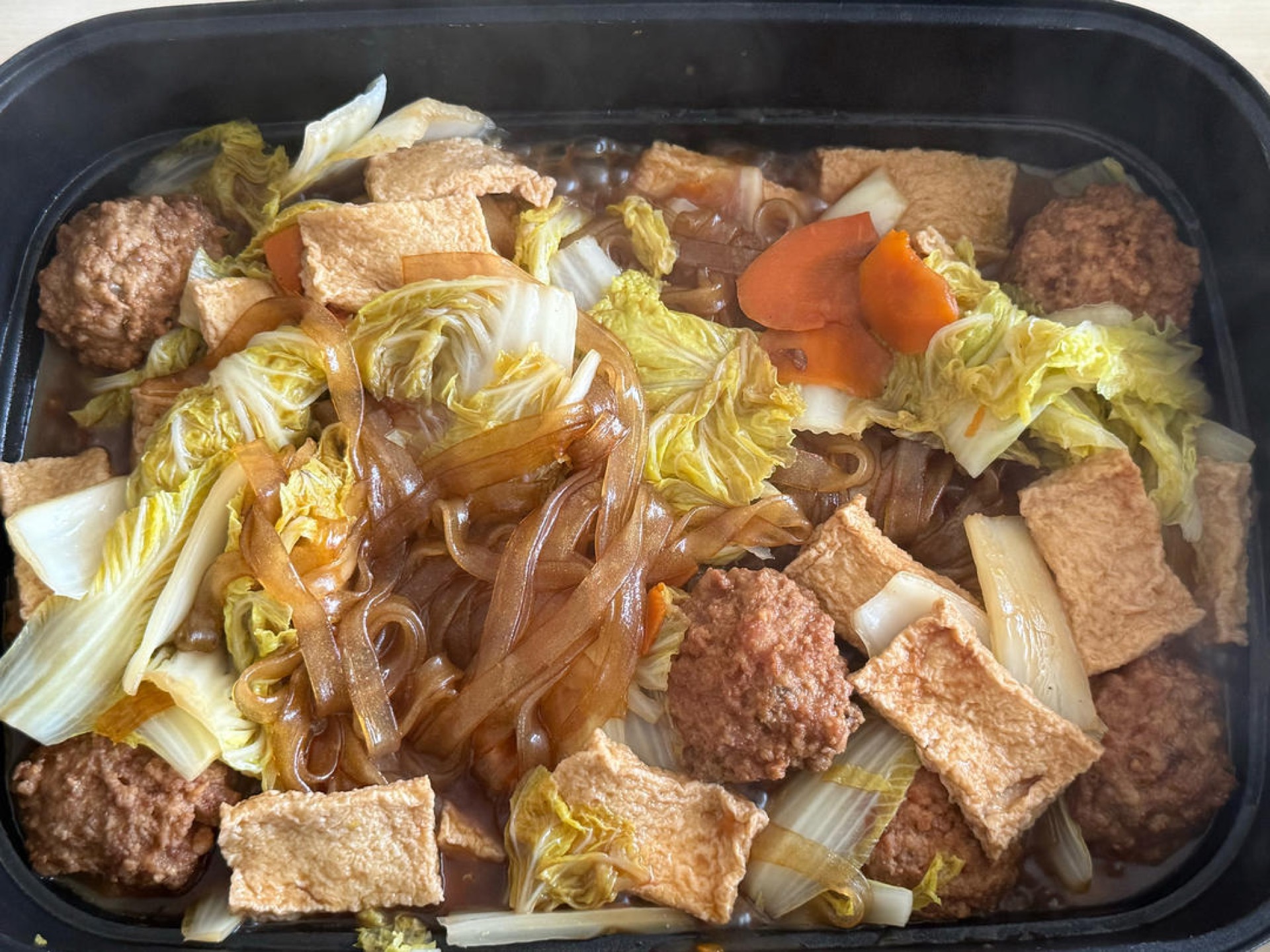 Once the vermicelli are soft and have soaked up the sauce, taste, adjust the seasoning, and serve.
