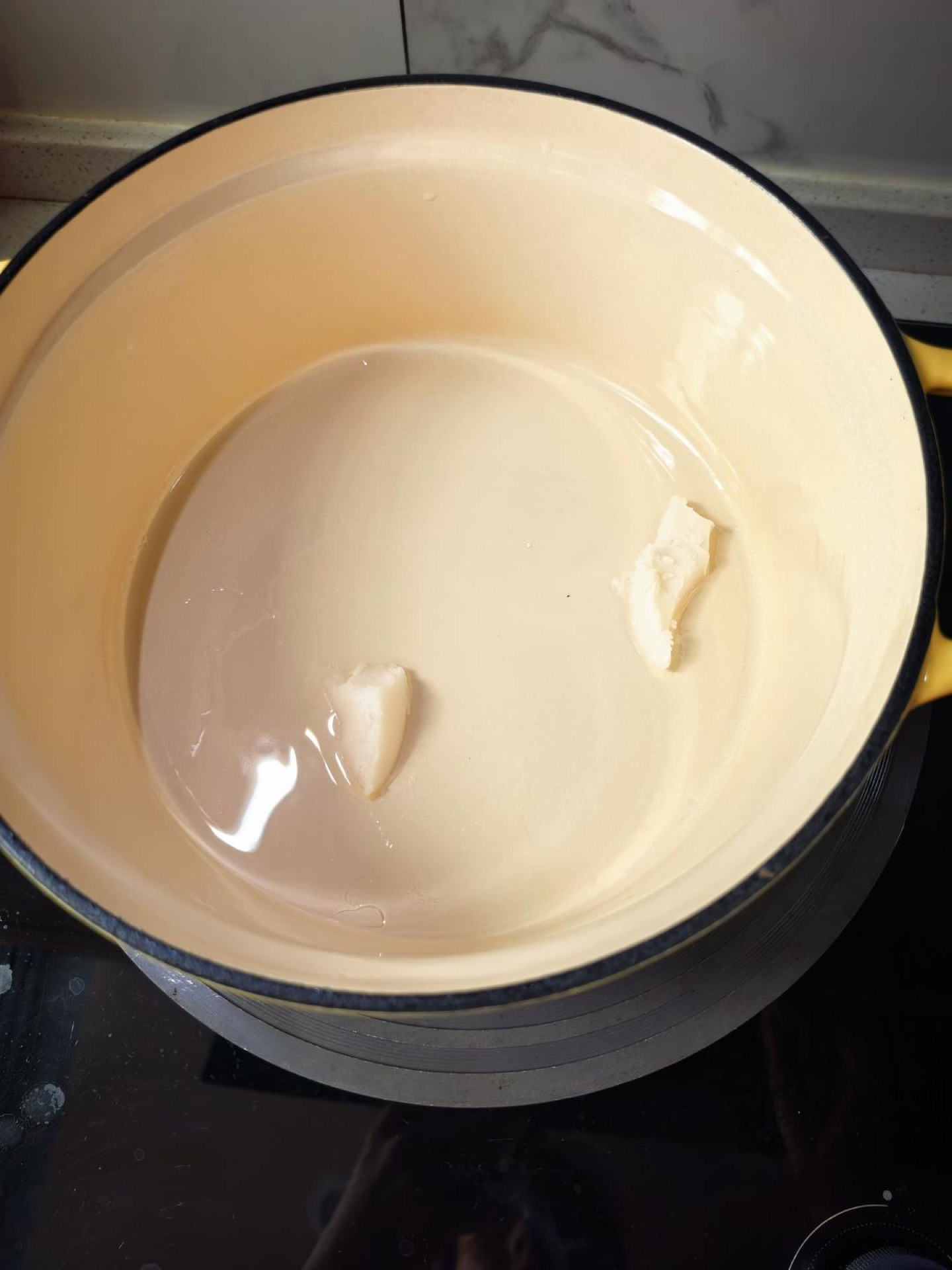 Add a little oil — if you don't have a braising pot, a pressure cooker works the same way.