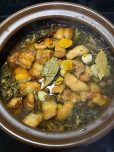 Braising liquid added to the clay pot