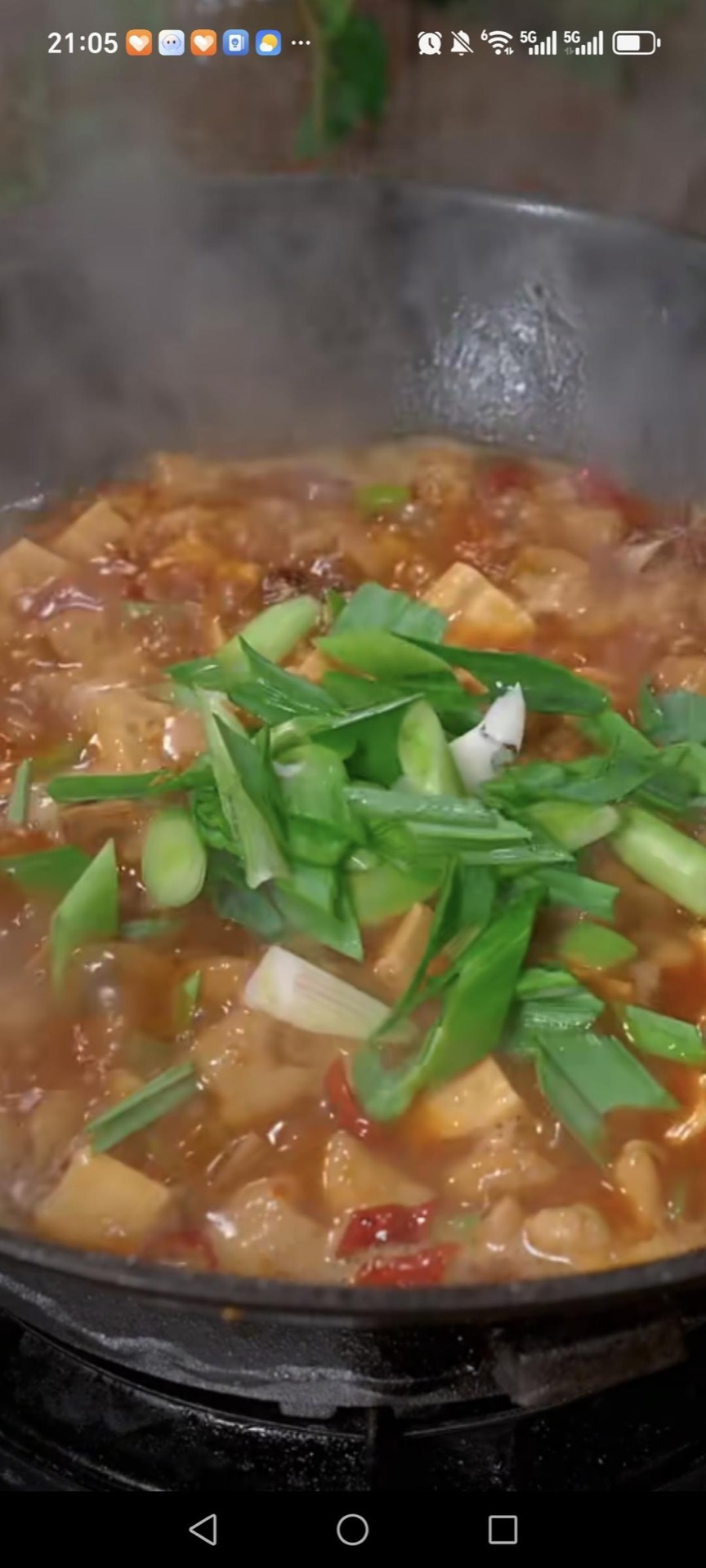 Scatter in the chopped scallions and give everything a final gentle toss.