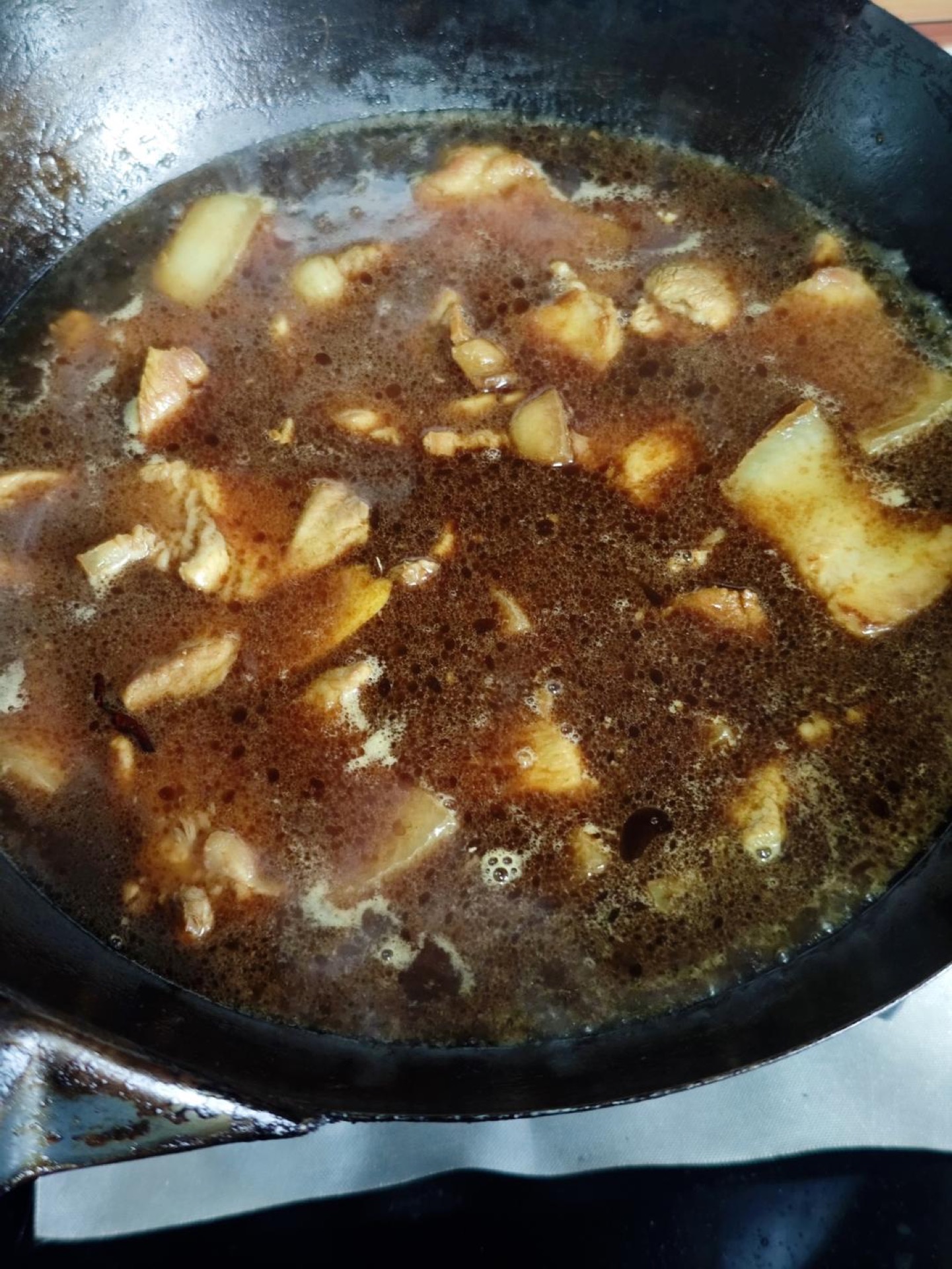 Pour in boiling water to cover the meat, bring to a boil, cover, and turn the heat to medium-low for 10 minutes.