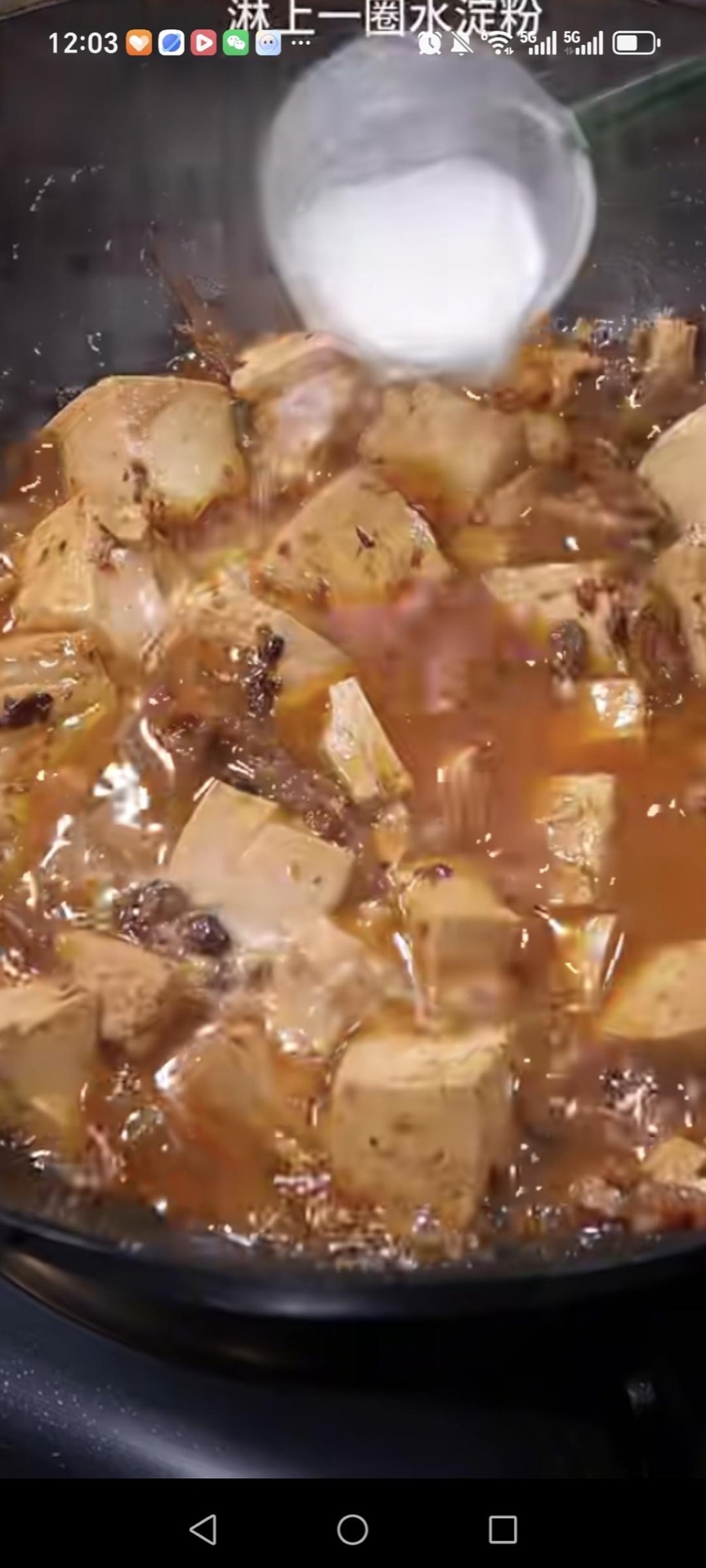 Pour in the cornstarch slurry and cook until the sauce turns glossy and thick.