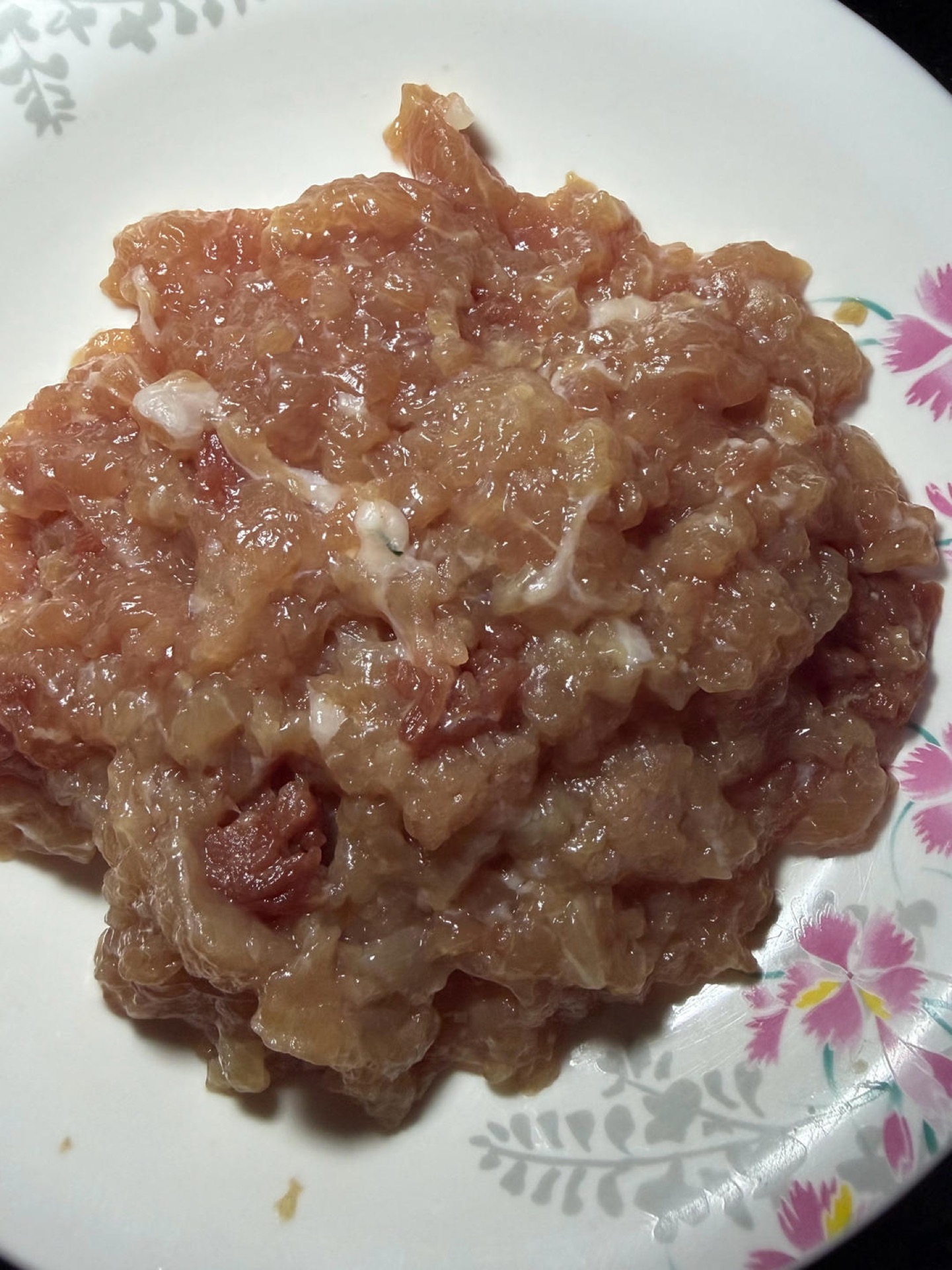 Chop the lean pork finely with a knife, or pulse it briefly, until it looks like coarse mince; set it aside.