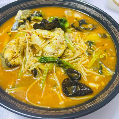 Braised yellow catfish with perilla in a dark glossy sauce