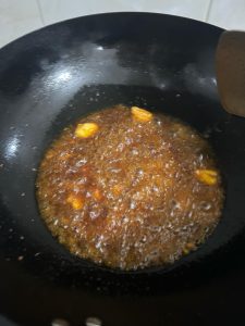 Garlic and chili paste frying with the fish
