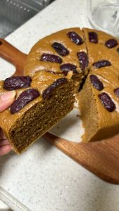 Brown sugar cake sliced to show its soft springy crumb
