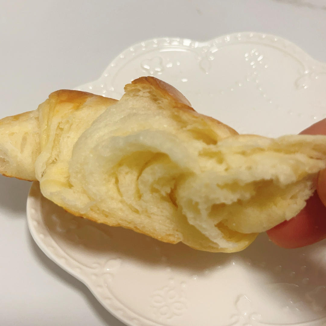 Tearing the soft pull apart butter bread buns