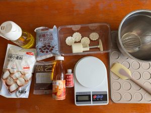 Mooncake ingredients and tools laid out on the counter