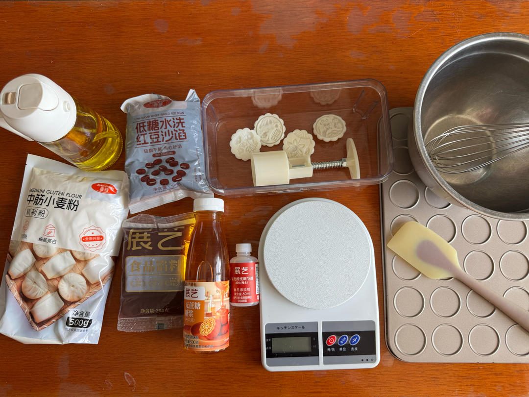 Mooncake ingredients and tools laid out on the counter