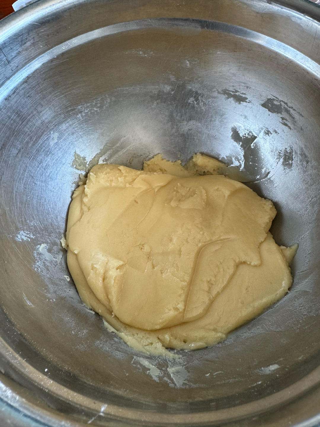 Flour being mixed into the syrup dough